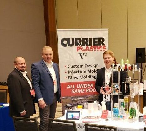 Currier Plastics team at TricorBraun event
